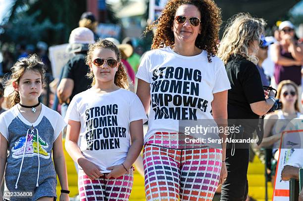 Demonstrators attend the rally at the Women's March at Bayfront Park Amphitheater on January 21, 2017 in Miami, Florida.