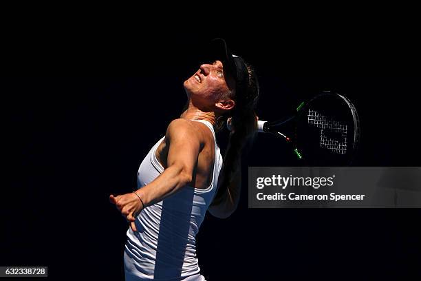 Mona Barthel of Germany serves in her fourth round match against Venus Williams of the United States on day seven of the 2017 Australian Open at...