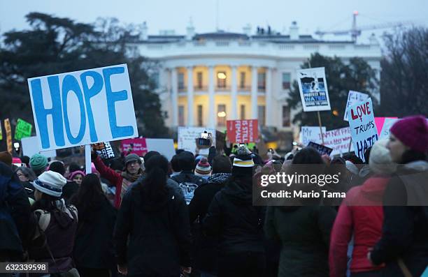 Protesters gather outside the White House at the finish of the Women's March on Washington on January 21, 2017 in Washington, DC. Large crowds...