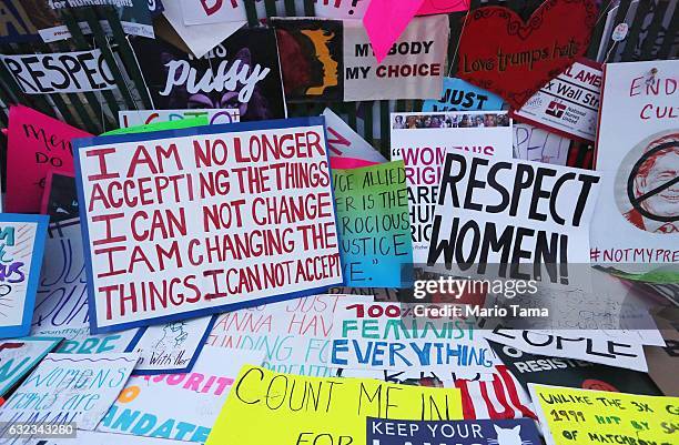 Protester's signs are left near the White House during the Women's March on Washington on January 21, 2017 in Washington, DC. Large crowds are...