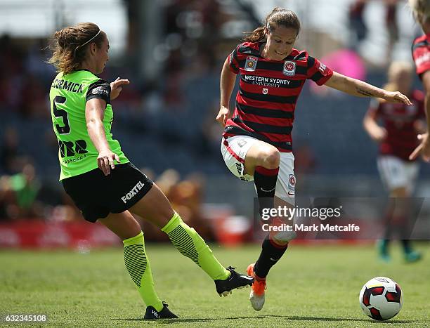 Kendall Fletcher of the Wanderers and Jemma McCormick of Canberra compete for the ball during the round 13 W-League match between the Western Sydney...