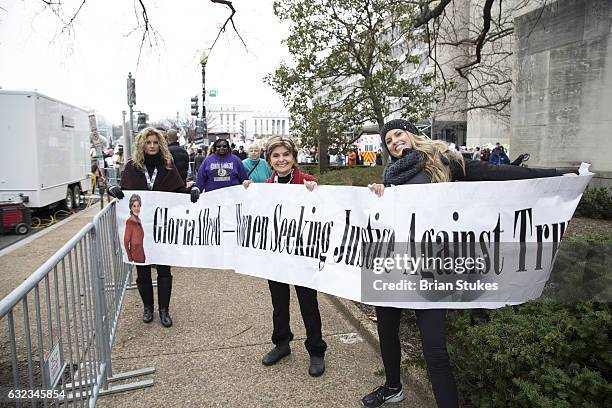 Summer Zervos, Gloria Allred and Temple Taggart attend the rally at the Women's March on Washington on January 21, 2017 in Washington, DC.