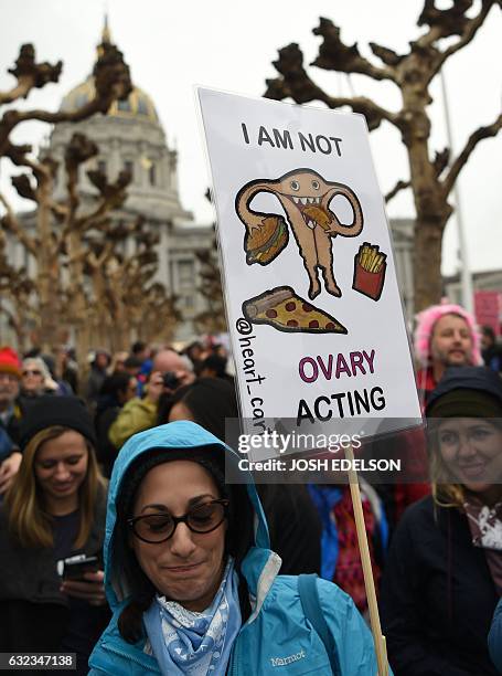 Thousands of people gather at City Hall to protest President Donald Trump and to show support for women's rights in San Francisco on January 21,...