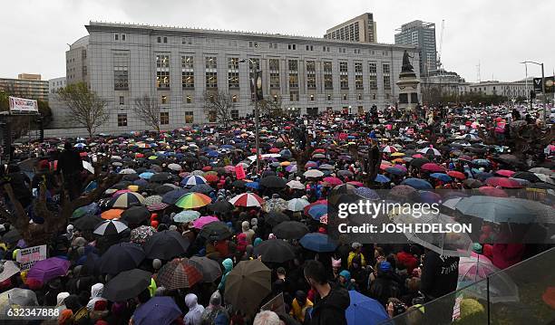 Thousands of people gather at City Hall to protest President Donald Trump and to show support for women's rights in San Francisco on January 21,...