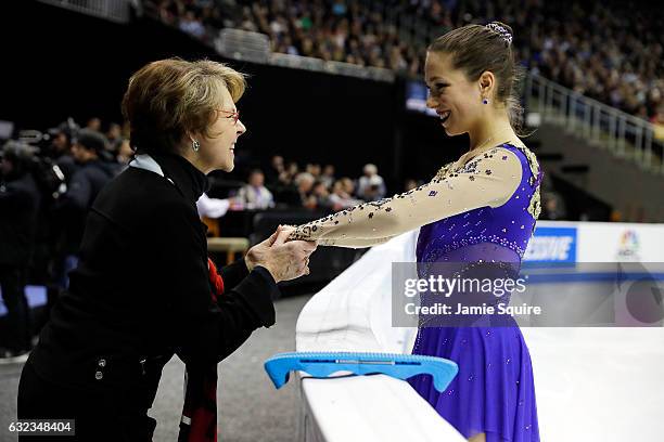 Livvy Shilling shares a moment with coach Christy Krall prior to competing in the Championship Ladies Free Skate during the 2017 U.S. Figure Skating...