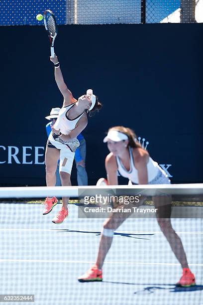Aleksa Cveticanin and Seone Mendez of Australia compete in their first round match against Bianca Vanessa Andreescu of Canada and Carson Branstine of...