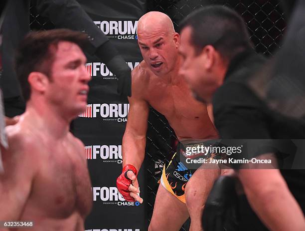 Tito Ortiz reacts as referee John McCarthy checks on Chael Sonnen after stopping their Bellator MMA light heavyweight fight in round one of at The...
