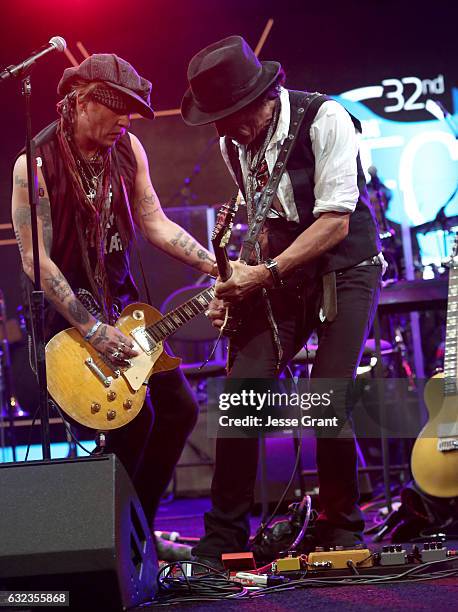 Actor Johhny Depp and musician Joe Perry perform onstage at the TEC Awards during NAMM Show 2017 at the Anaheim Hilton on January 21, 2017 in...