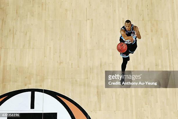 Akil Mitchell of the Breakers drills the mid-court shot after the first quarter buzzer during the round 16 NBL match between the New Zealand Breakers...