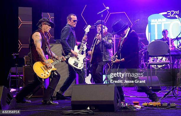 Musicians Johnny Depp, Robert DeLeo , Brad Whitford and Joe Perry perform onstage at the TEC Awards during NAMM Show 2017 at the Anaheim Hilton on...