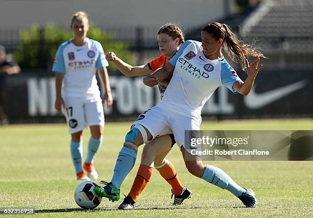 Laura Alleyway of Melbourne City is challenged by Cortnee Vine of Brisbane Roar during the round 13 W-League match between Melbourne City and...