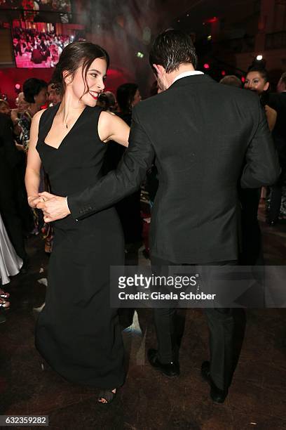 Aylin Tezel and Clemens Schick dance during the 44th German Film Ball 2017 party at Hotel Bayerischer Hof on January 21, 2017 in Munich, Germany.