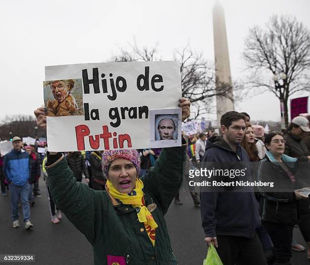 Marcher attending the Women's March on Washington holds up an anti-President Donald Trump sign on January 21, 2017 in Washington, DC. President Trump...