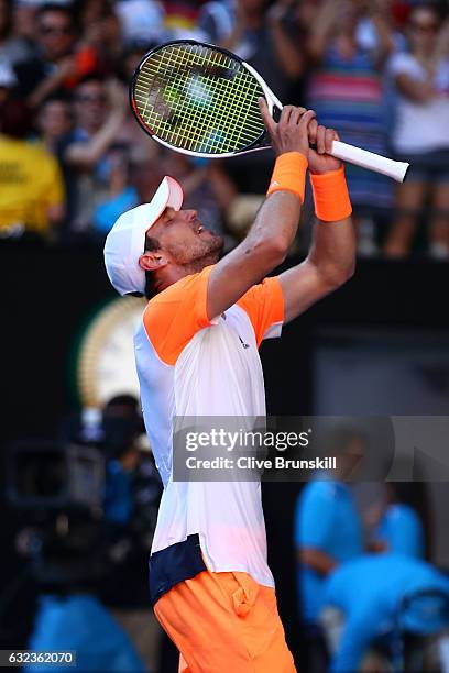 Mischa Zverev of Germany celebrates winning his fourth round match against Andy Murray of Great Britain on day seven of the 2017 Australian Open at...