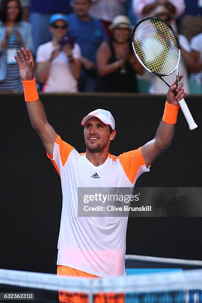 Mischa Zverev of Germany celebrates winning his fourth round match against Andy Murray of Great Britain on day seven of the 2017 Australian Open at...