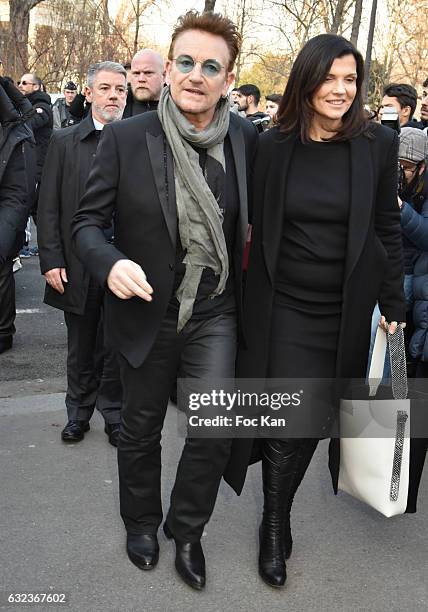 Bono and Ali Hewson attend the Dior Homme Menswear Fall/Winter 2017-2018 show as part of Paris Fashion Week on January 21, 2017 in Paris, France.