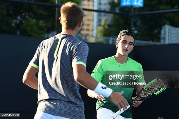 Dan Added of France and Matteo Martineau of France compete in their first round match against Simon Carr of Ireland and Max Stewart of Great Britain...