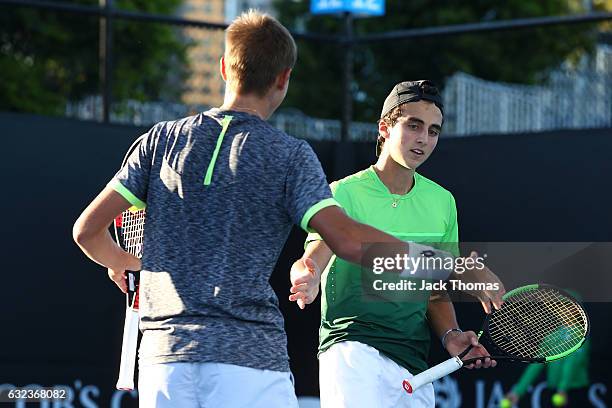 Dan Added of France and Matteo Martineau of France compete in their first round match against Simon Carr of Ireland and Max Stewart of Great Britain...