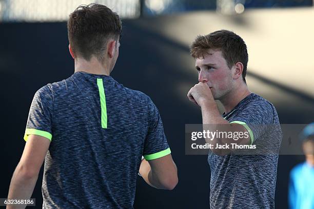 Simon Carr of Ireland and Max Stewart of Great Britain compete in their first round match against Dan Added of France and Matteo Martineau of France...