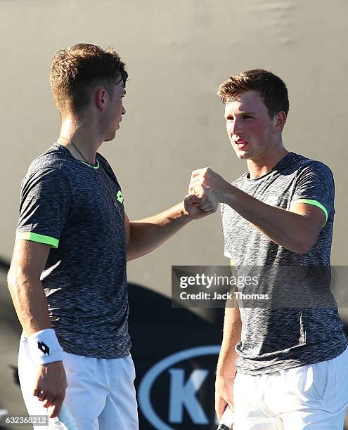 Simon Carr of Ireland and Max Stewart of Great Britain compete in their first round match against Dan Added of France and Matteo Martineau of France...