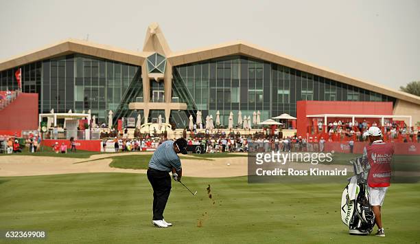 Kiradech Aphibarnrat of Thailand plays his second shot on the par four 10th hole during the final round of the Abu Dhabi HSBC Championship at Abu...