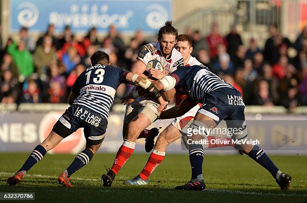 Belfast , Ireland - 21 January 2017; Stuart McCloskey of Ulster being tackled by Jean-Baptiste Dubié and Joe Edwards of Bordeaux-Begles during the...