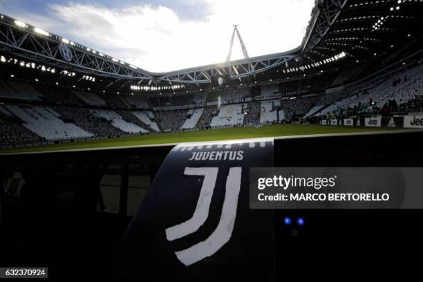 The new logo of Juventus football club is pictured on a flyer before the Italian Serie A football match Juventus vs Lazio on January 22, 2017 at the...