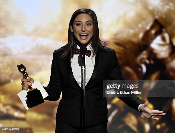 Adult film actress Abella Danger accepts the award for Best Star Showcase during the 2017 Adult Video News Awards at The Joint inside the Hard Rock...