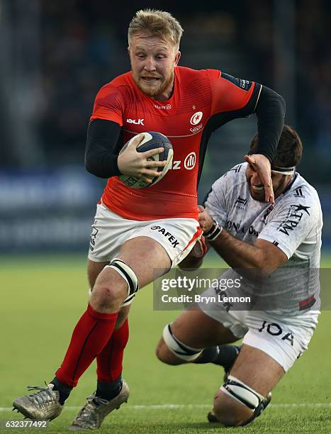 Juan Fernandez Lobbe of Toulon tackles Jackson Wray of Saracens during the European Rugby Champions Cup match between Saracens and RC Toulon on...