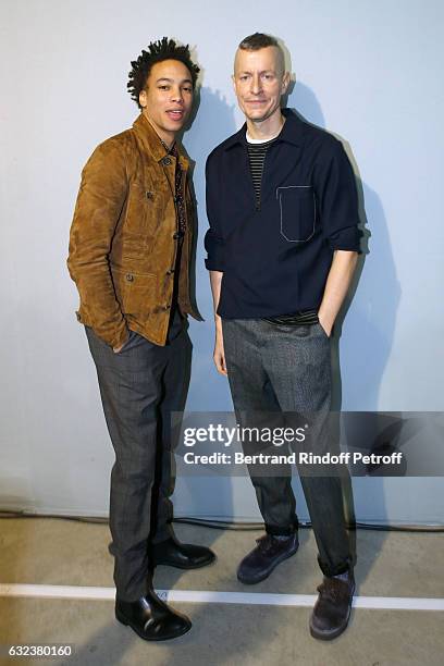 Actor Corentin Fila and Stylist of 'Lanvin Men', Lucas Ossendrijver attend the Lanvin Menswear Fall/Winter 2017-2018 show as part of Paris Fashion...