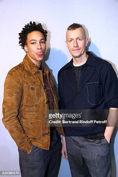 Actor Corentin Fila and Stylist of 'Lanvin Men', Lucas Ossendrijver attend the Lanvin Menswear Fall/Winter 2017-2018 show as part of Paris Fashion...