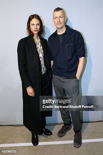 Model Aymeline Valade and Stylist of 'Lanvin Men', Lucas Ossendrijver attend the Lanvin Menswear Fall/Winter 2017-2018 show as part of Paris Fashion...