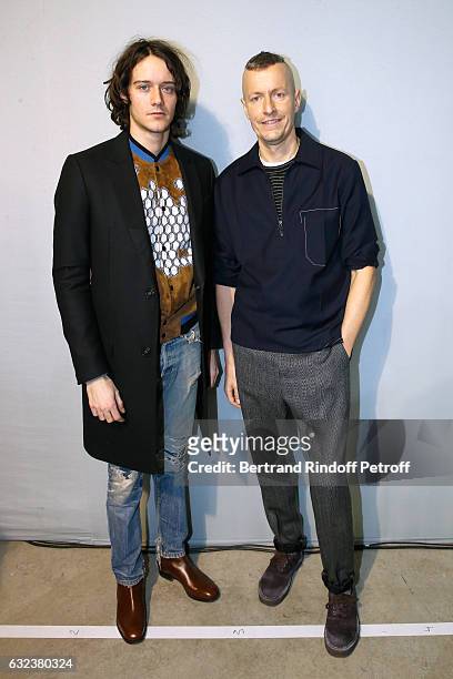 Actor Cesar Domboy and Stylist of 'Lanvin Men', Lucas Ossendrijver attend the Lanvin Menswear Fall/Winter 2017-2018 show as part of Paris Fashion...