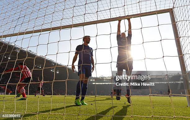 Robert Huth and Christian Fuchs of Leicester City show dejection after Southampton's second goal during the Premier League match between Southampton...