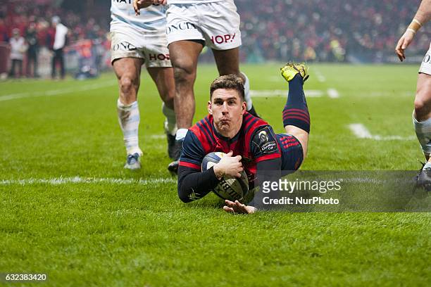 Ian Keatley of Munster scores a try during the European Rugby Champions Cup Round 6 match between Munster Rugby and Racing 92 at Thomond Park Stadium...