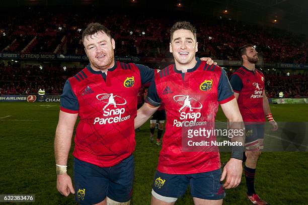 Dave Kilcoyne and Ronan O'Mahony of Munster celebrate after the European Rugby Champions Cup Round 6 match between Munster Rugby and Racing 92 at...
