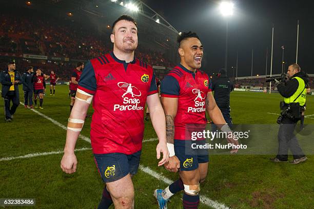 Niall Scannell and Francis Saili of Munster celebrate after the European Rugby Champions Cup Round 6 match between Munster Rugby and Racing 92 at...