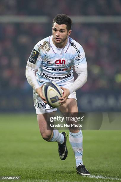 Brice Dulin of Racing runs with the ball during the European Rugby Champions Cup Round 6 match between Munster Rugby and Racing 92 at Thomond Park...