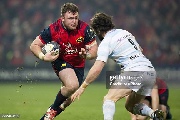 Dave Kilcoyne of Munster runs with the ball during the European Rugby Champions Cup Round 6 match between Munster Rugby and Racing 92 at Thomond Park...