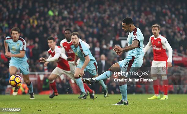 Andre Gray of Burnley converts the penalty to score his side's first goal to make it 1-1 during the Premier League match between Arsenal and Burnley...