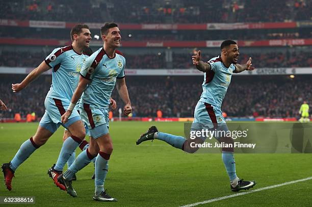 Andre Gray of Burnley celebrates scoring his team's first goal from the penalty spot during the Premier League match between Arsenal and Burnley at...