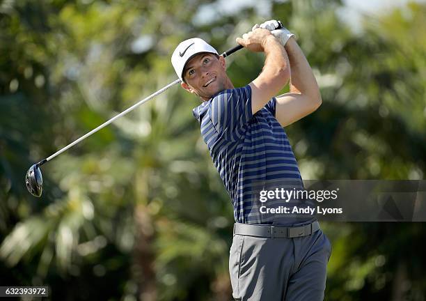 Luke Guthrie hits his tee shot on the 14th hole during the first round of The Bahamas Great Abaco Classic at Abaco Club on January 22, 2017 in Great...