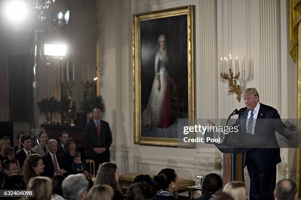 President Donald Trump speaks during a swearing ceremony of White House senior staff in the East Room of the White House on January 22, 2017 in...