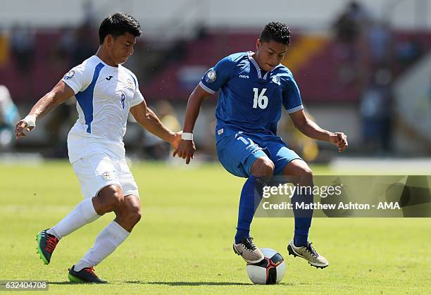 Oscar Delgado of El Salvador competes with Marlon Lopez of Nicaragua during the Copa Centroamericana match between El Salvador and Nicaragua at...