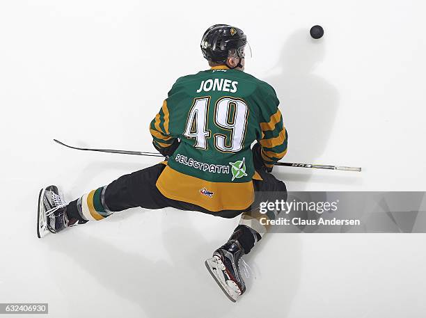 Max Jones of the London Knights stretches during the warm-up prior to play against the Niagara IceDogs in an OHL game at Budweiser Gardens on January...