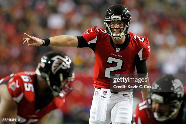 Matt Ryan of the Atlanta Falcons signals in the first quarter against the Green Bay Packers in the NFC Championship Game at the Georgia Dome on...