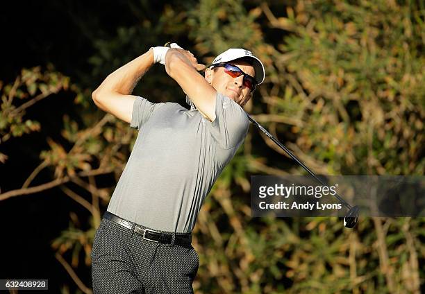 Scott Langley hits his tee shot on the 13th hole during the first round of The Bahamas Great Abaco Classic at Abaco Club on January 22, 2017 in Great...