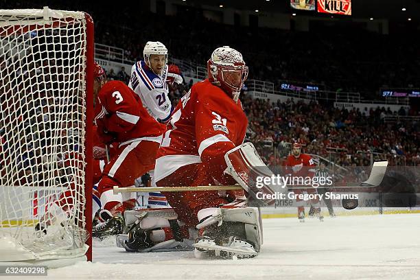 Jared Coreau of the Detroit Red Wings makes a save while playing the New York Rangers at Joe Louis Arena on January 22, 2017 in Detroit, Michigan....