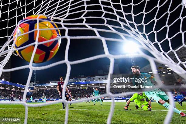 Lionel Messi of FC Barcelona scores his team's second goal during the La Liga match between SD Eibar and FC Barcelona at Ipurua stadium on January...