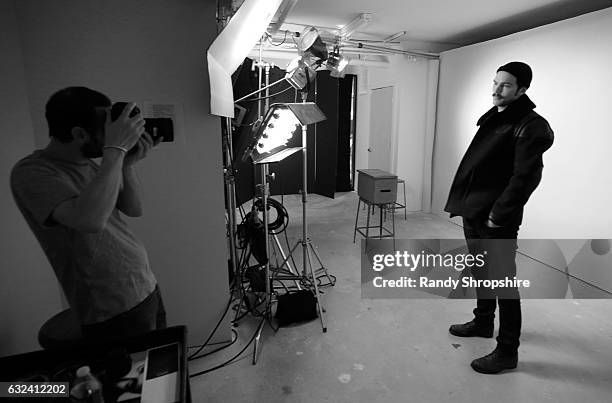 Actor Nicholas Hoult and photograher Jeff Vespa behind the scenes in the WireImage Portrait Studio at AT&T At The Lift during the 2017 Sundance Film...